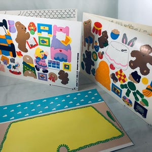 May include: A collection of vintage paper sticker sheets featuring colorful illustrations of teddy bears, furniture, and other decorative elements. The stickers are designed for children's crafts and scrapbooking projects.