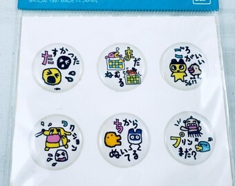 Tamagotchi plastic style sticker sheet.  Generation 1.  Dated 1997.  Made in Japan by Bandai