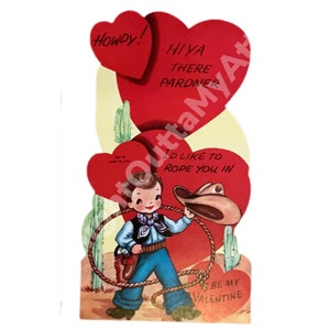 May include: A vintage Valentine's Day card featuring a cartoon cowboy with a lasso, a cowboy hat, and a gun. The card has a red, white, and yellow colour scheme and features the text "Howdy! Hiya there pardner I'd like to rope you in Be my Valentine."