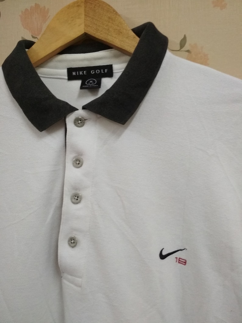 swoosh long sleeve polo