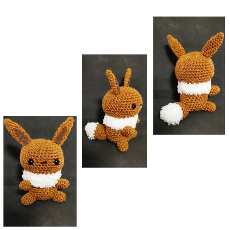 K&ouml;nnte beinhalten: Ein braunes und wei&szlig;es geh&auml;keltes Eevee Pl&uuml;schtier. Das Spielzeug hat einen wei&szlig;en, flauschigen Schwanz und einen wei&szlig;en Kragen.