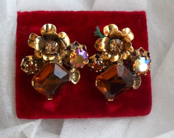 50's French Clip On Earrings. Organic Earrings Rhinestones Smoked Topaz with a cristal with Aurora Borealis in a fantastic brass floral work