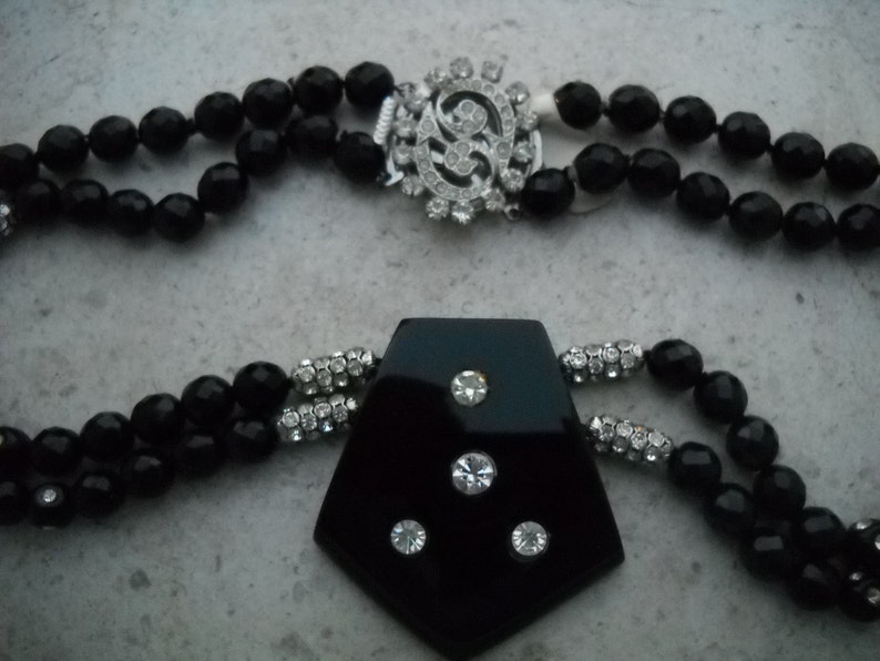 Fantastic Clasp in crystals. 60/'s Czechoslovak Necklace; Two laps Black Glass Crystal Beads with an irregular pentagonal shape in center