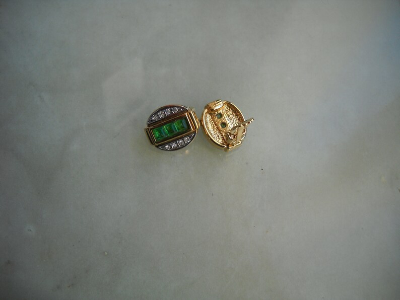 Single specimen Oval shape in brass golp plated with crystals and in rectangular central part Green rhinstones 80/'s Austrian Earrings