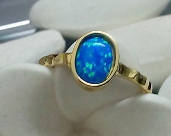 Opal ring, blue opal jewelry, oval fire opal, gemstone ring, delicate ring, gold ring, hammered band