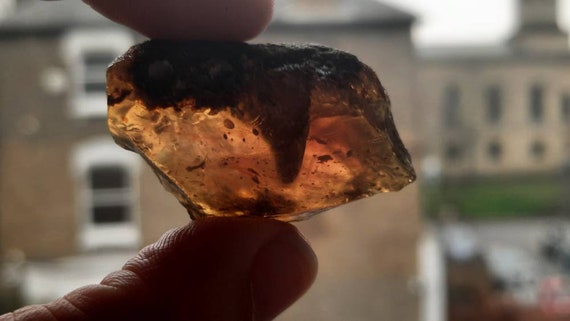 Blue Amber Raw Edge Free form Slices From Sumantra, Indonesia Blue Amber Raw Edge Free form Slices From Sumantra, Indonesia