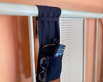 Organizador de control remoto para mesita de noche con doble bolsillo y soporte para andador.