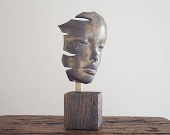 Sculpture. Pensive VII  -  Face sculpture on wooden plynth. Handmade studio pottery.