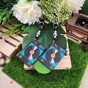 Turntable Plugs: Retro DJ Gauges with Vinyl Charm and Bead Stack