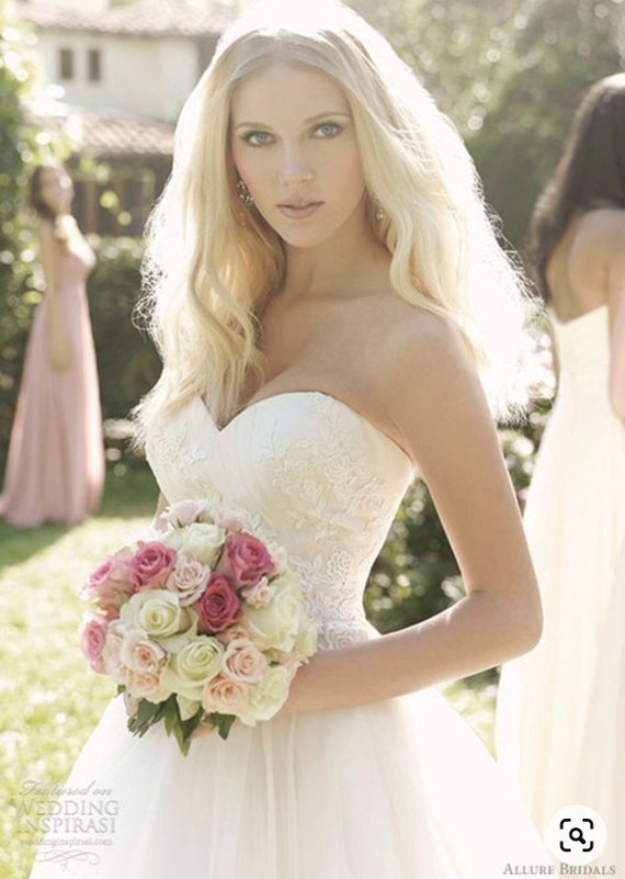 Ivory tulle on champagne, strapless ball wedding g