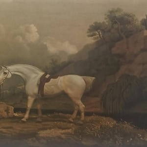 May include: An antique painting depicts a white horse with a saddle, a person in a dark coat, and a white dog. The scene is set in a landscape with a body of water, hills, and trees, evoking a sense of history and classic art.