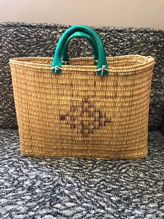 Stunning 1940's woven wicker bag with green handle