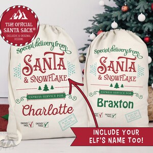 May include: Two white canvas Santa sacks with red and green text. The text reads "Special delivery from: Santa & Snowflake" and "Express Service For:" followed by a name. The names are "Charlotte" and "Braxton". The sacks have a red and green checked box with a check mark in it. The text "Include your elf's name too!" is at the bottom of the image.