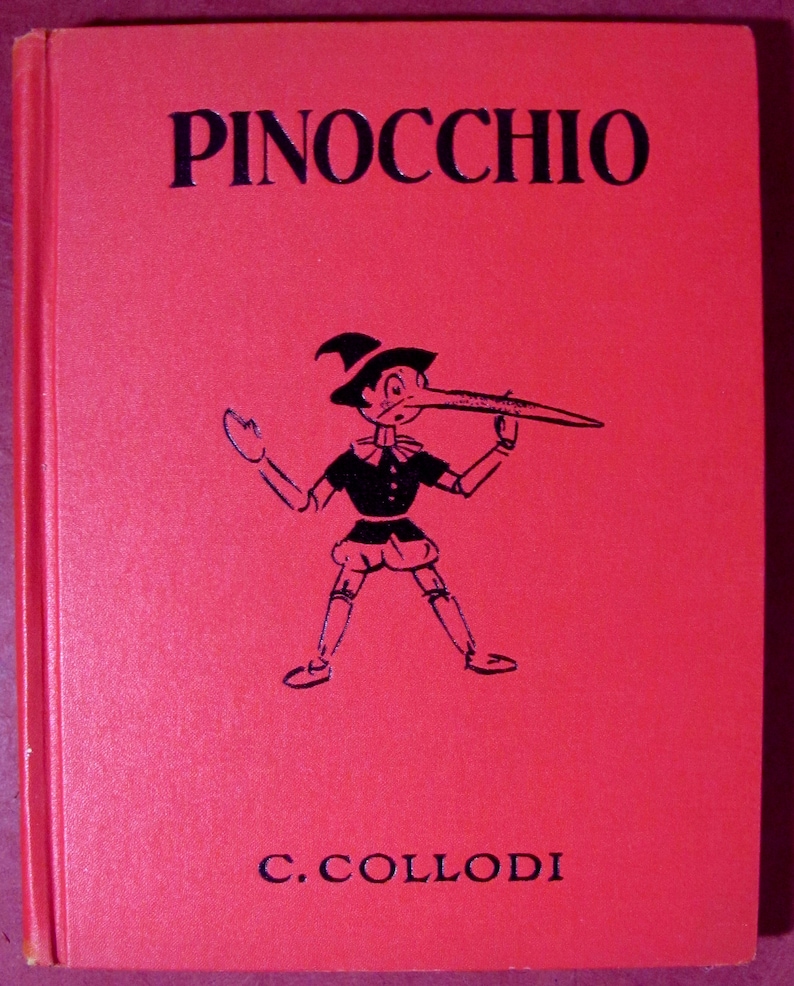 Pinocchio Lettering Pinocchio by C. Collodi Edited by Watty Piper Illustrated by Tony Sarg ...