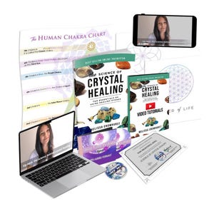 May include: A collection of educational materials including a laptop displaying a video, a book titled The Science of Crystal Healing, a video tutorial guide, a Human Chakra Chart, a certificate of completion, and a circular crystal healing sticker.