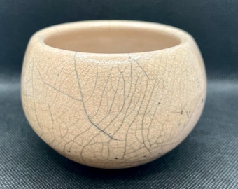 Hand thrown studio art potter raku small round white black bowl vessel artist signed