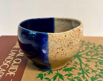 Handmade studio pottery stoneware bowl two tone design glossy blue and speckled beige glaze