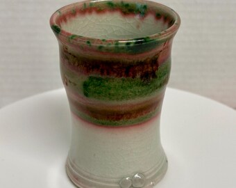 Gorgeous small celadon ware or greenware  pottery vase , cup , pencil holder , makers mark on bottom with pretty pink glaze