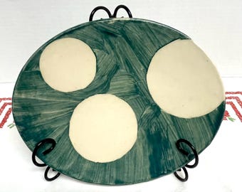 Handmade studio art pottery oval footed trinket tray catch all green with white circles dots , makers mark on bottom
