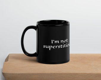 I'm not superstitious. I'm just a little stitious. Funny mug. Great gift for anyone with a sense of humor and a love of language.
