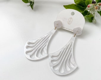 Erté Neo-Deco drop earrings in pearl acrylic