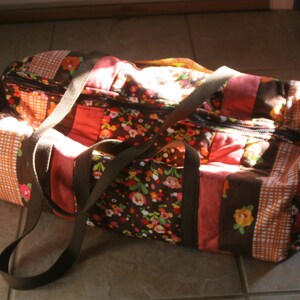 Brown and Orange Flowered Duffle Bag