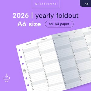 May include: A yearly foldout calendar for 2026 in A6 size, designed for A4 paper. The calendar features a white layout with monthly grids, and is displayed against a purple background. The text "WHATSHEWAS" and "PDF" are also visible.