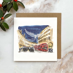 Un ange de Noël illumine Regent Street à Londres, carte de voeux illustrée