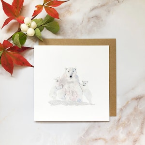 Carte de Noël illustrée de la famille des ours polaires