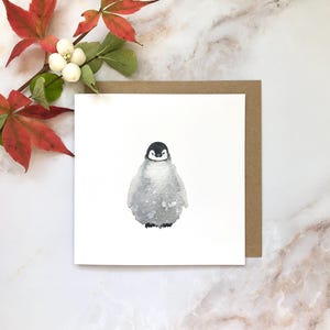 Carte de Noël illustrée Poussin pingouin flou