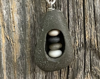 Beach Stone Cairn Set within an Oblong Beach Stone Pendant Necklace