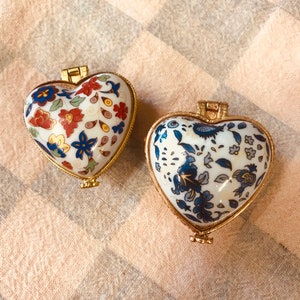 Heart shaped trinket boxes filled with solid floral perfume.  You get to pick the scent.