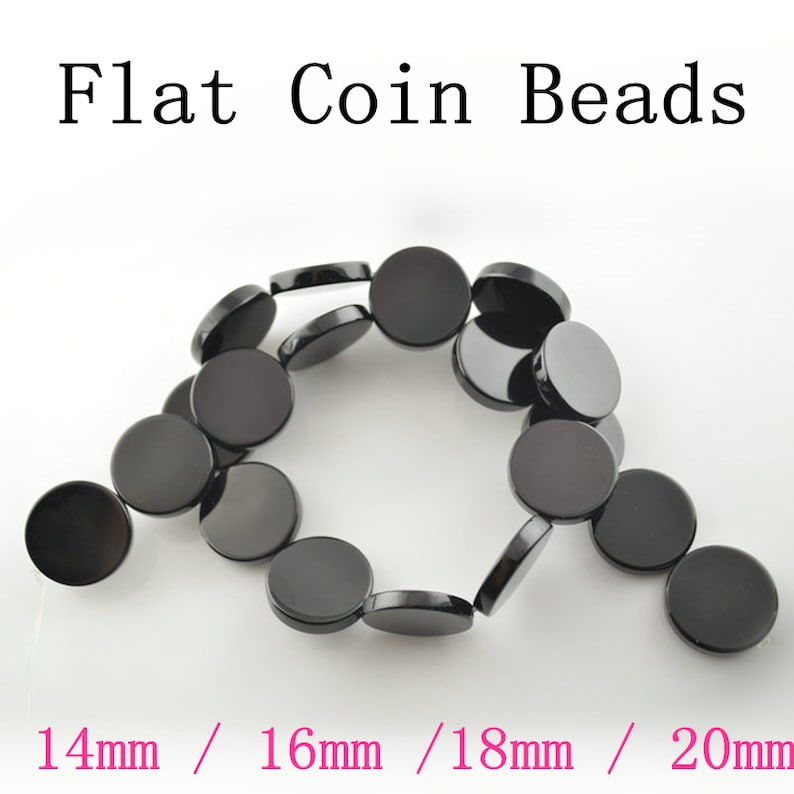 May include: A strand of black flat coin beads in various sizes, including 14mm, 16mm, 18mm, and 20mm. The beads are smooth and have a glossy finish.