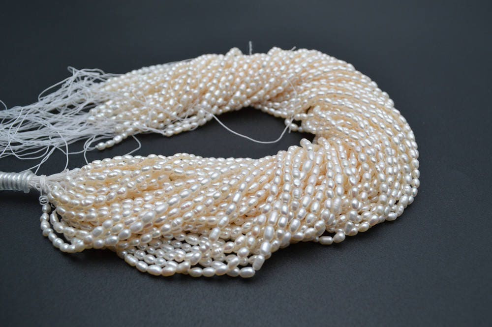 Rice Pearl Beads 5 to 7mm long and approx. 4mm wide, Fresh Water Natural Pearl  Strands 13.5inch Long, Wholesale rates, Bulk Pricing options