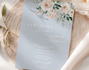 May include: A light blue wedding invitation with floral accents. The invitation features the names "Samantha Parker + Aaron Stephenson" and event details. The design includes white roses and greenery, with text in a delicate script font.