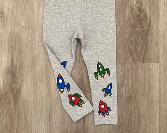 Kids rocket ships leggings, toddler space theme leggings, children galaxy rocket man pants, baby hand painted pants