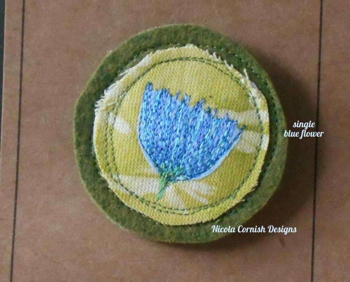 Flower Brooch Free Machine Applique on to Cotton Fabric and Wool Mix