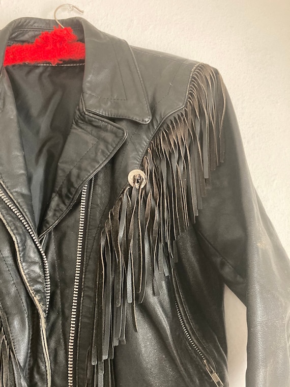 Vintage black leather fringe motorcycle jacket