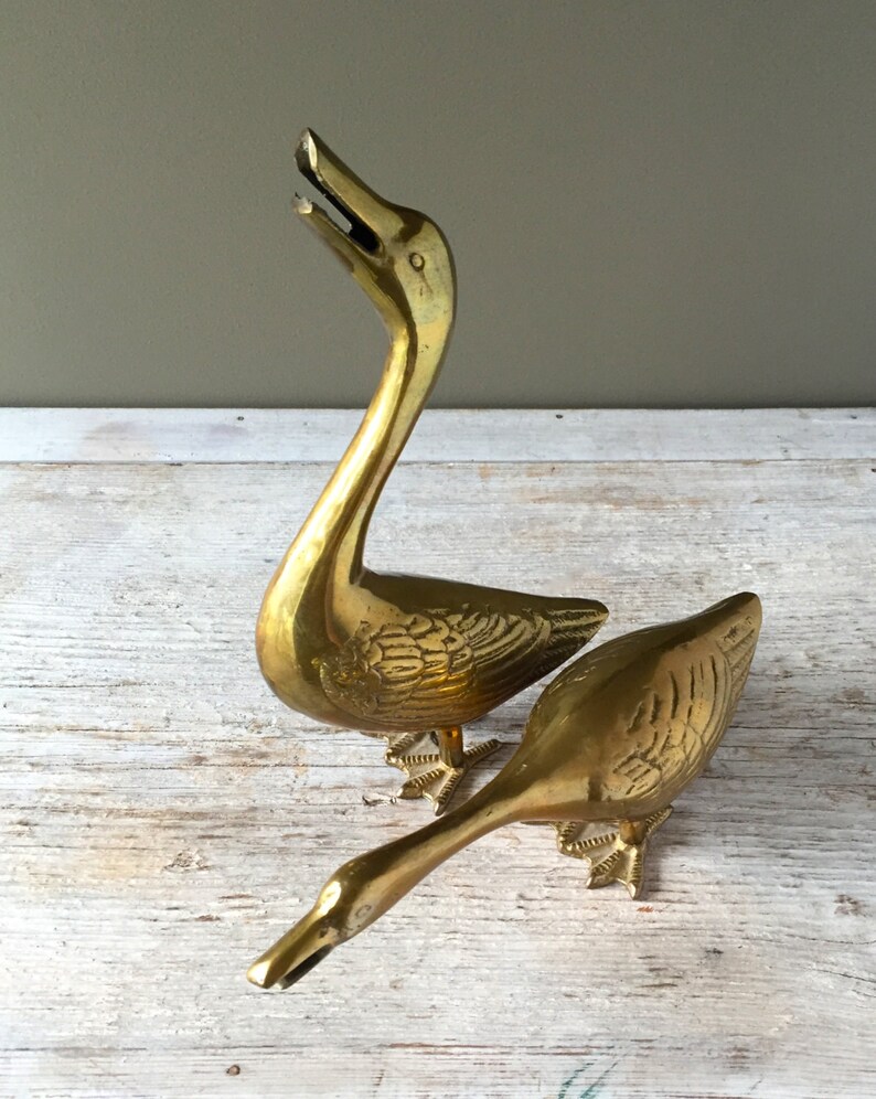 solid brass duck figurines