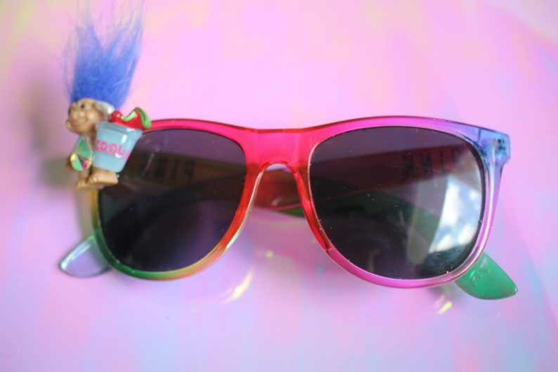 Troll sippin on juice upcycled handmade unique smiley face rainbow sunnies sunglasses