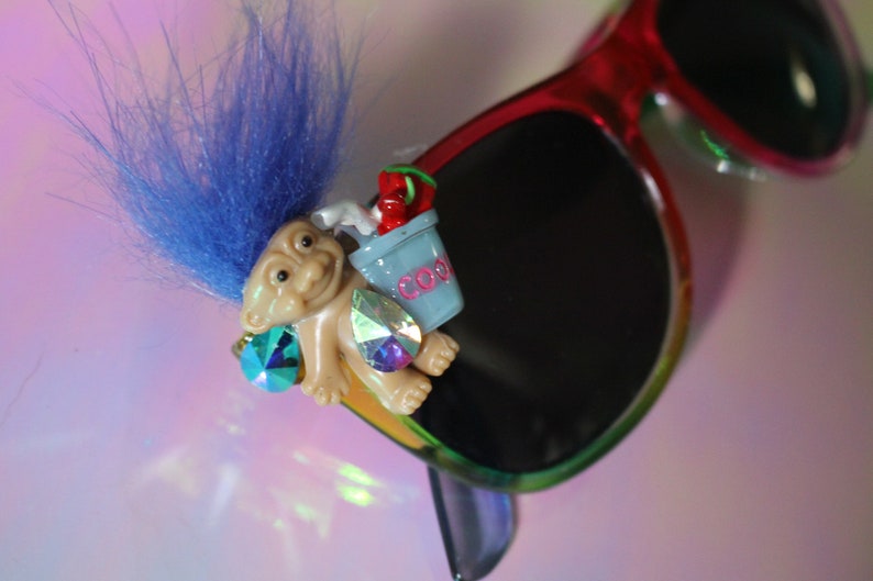 Troll sippin on juice upcycled handmade unique smiley face rainbow sunnies sunglasses