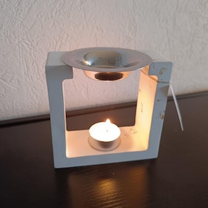 White and gold square incense burner.