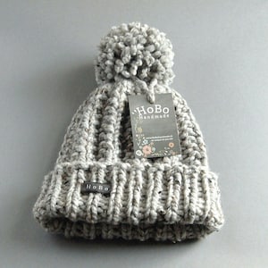 Womens Bobble Hat. Available in 9 Colours. HoBo Handmade thick chunky hand knitted beanie with large pom pom. Grey tweed wool blend XS to XL