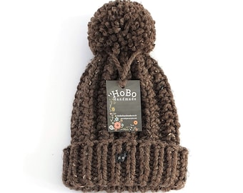 brown bobble hat