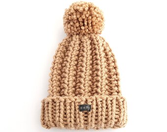 Handmade Womens Chunky Knit Camel Colour Bobble Hat. Hand knitted in easy care acrylic yarn with an extra large removable pom pom