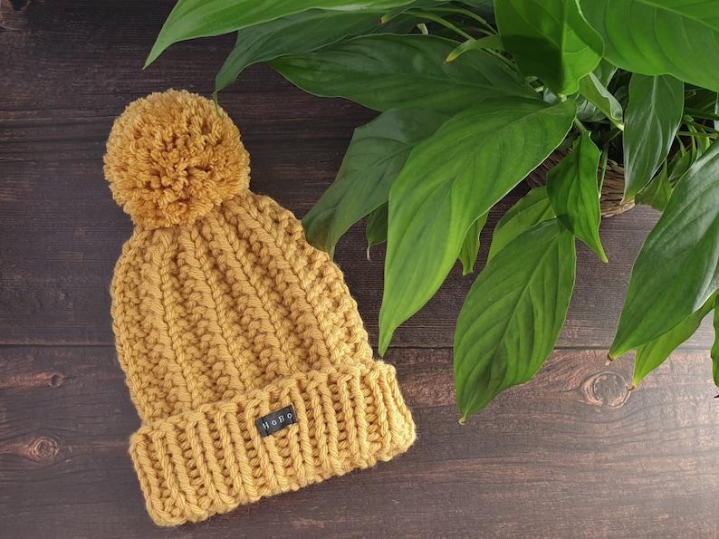 Yellow HoBo Handmade 'Lofty' Bobble Hat. Thick chunky hand knitted beanie with large removable pom pom. Wool blend. Available in 3 colours image 2