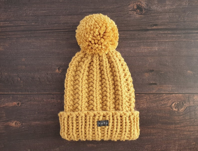 Yellow HoBo Handmade 'Lofty' Bobble Hat. Thick chunky hand knitted beanie with large removable pom pom. Wool blend. Available in 3 colours image 5