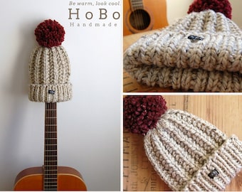 Mens handmade HoBo Lofty bobble hat. Thick chunky hand knit beanie large removable dark red pom pom. Neutral beige tweed wool blend XS - XXL