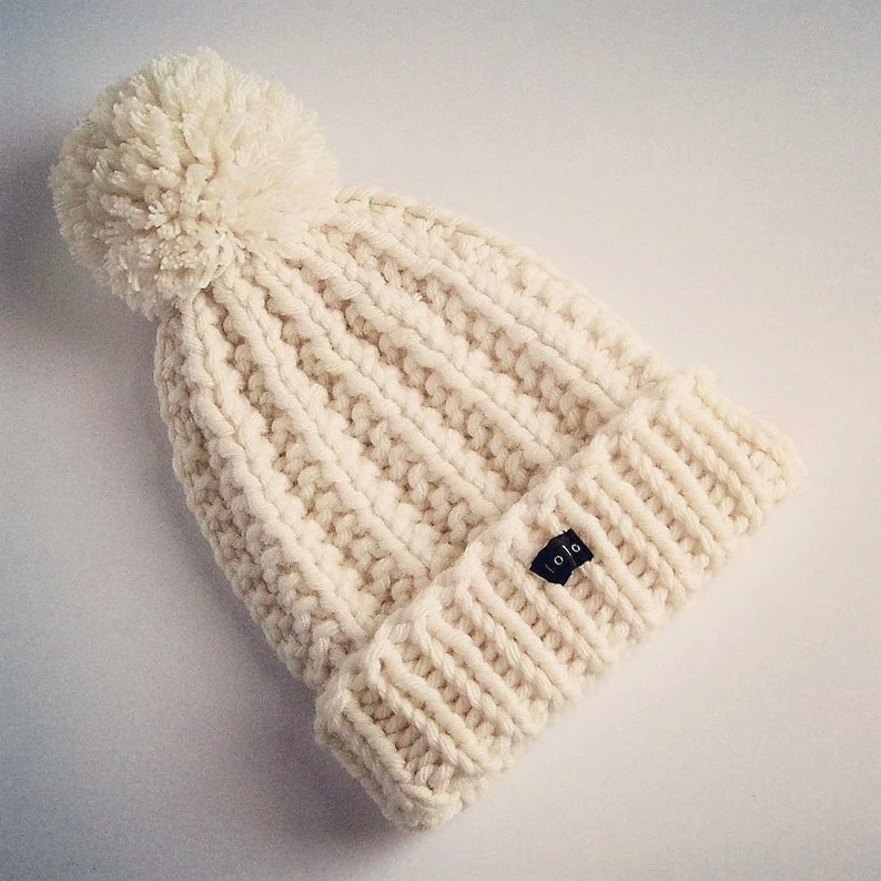 HoBo Handmade 'Lofty' Bobble Hat. Thick chunky hand knitted beanie. Large removable pom pom. Winter white/cream/ecru colour wool blend image 1