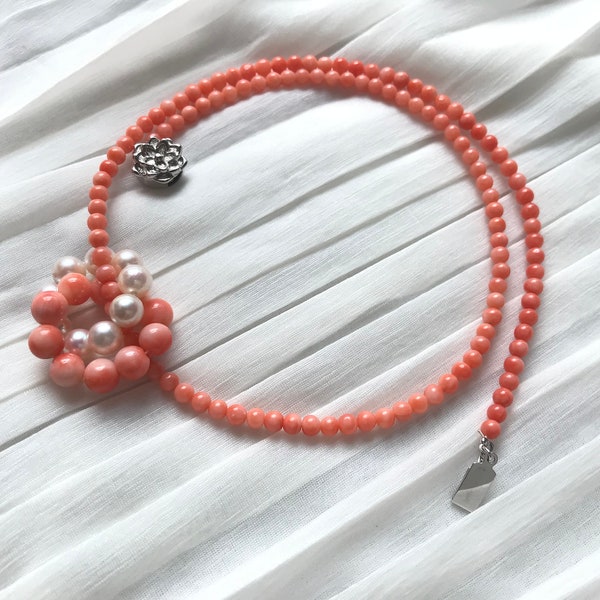 Pink coral and Akoya pearl interlocking circles pendant